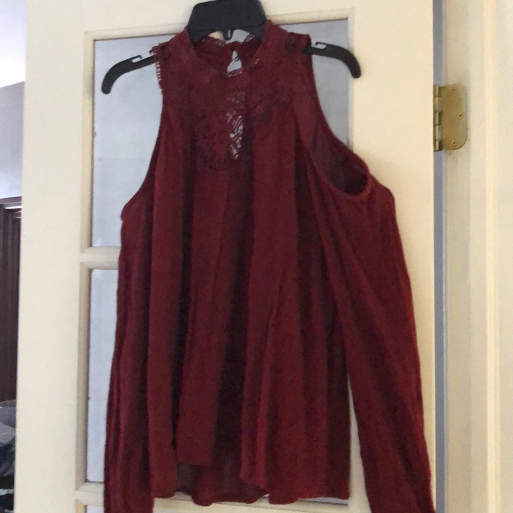 Wine colored top with tank/arms